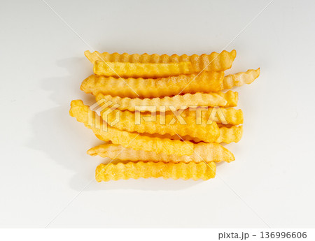 Frozen potato sticks isolated, iced finger chips 136996606