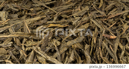 Green tea leaves macro textured background Green tea leaves macro textured background 136996667