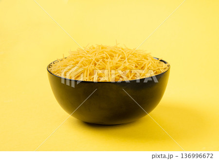 Raw vermicelli, gold soup pasta, small homemade noodles, thin Italy macaroni Raw vermicelli, gold soup pasta, small homemade noodles, thin Italy macaroni 136996672