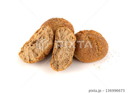 Brown rye bun isolated, round bread 136996673