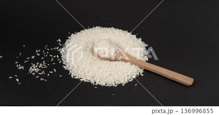 Grated coconut powder. Dry coco flakes pile, shredded desiccated coconut, tropical fruit chips Grated coconut powder. Dry coco flakes pile, shredded desiccated coconut, tropical fruit chips 136996855