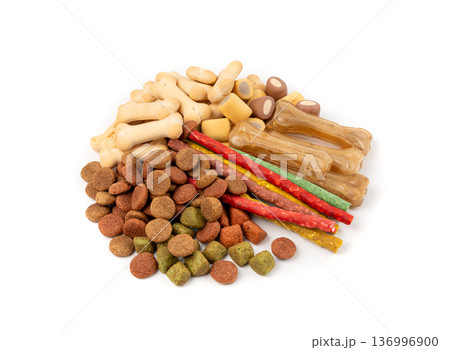 Dry pet food, dog color kibble pile, puppy meat and vegetable pellets, canine protein granules 136996900