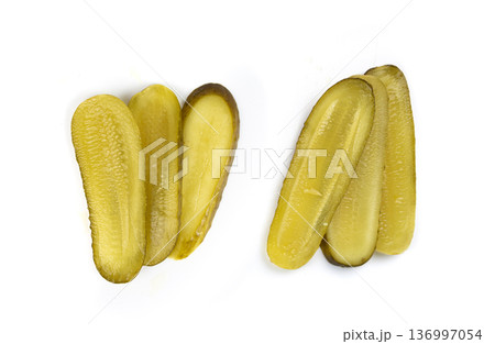 Pickled sliced cucumbers, fermented food, marinated canned vegetables, gherkins, pickles 136997054