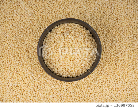 Puffed millet textured background 136997058