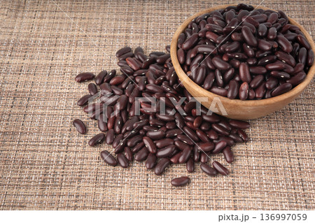 Red dry kidney beans. Uncooked bean pile, raw legume or red beans, rajma Red dry kidney beans. Uncooked bean pile, raw legume or red beans, rajma 136997059