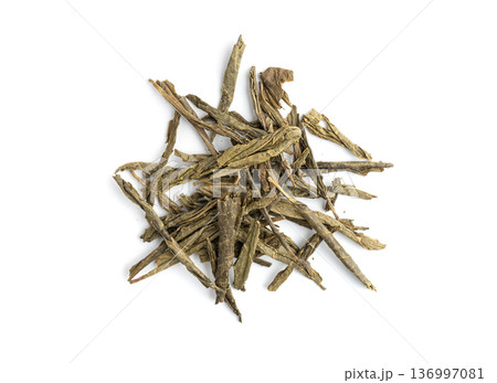 Green tea leaves macro textured background 136997081