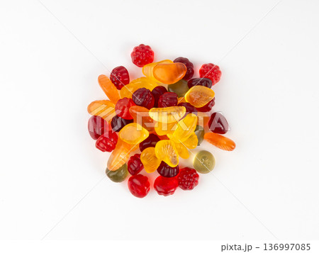 Fruit gummy candy pile isolated, vegan chewing marmalade pills, jelly gumdrops heap 136997085