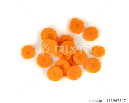 Round carrot slices isolated. Sweet orange vegetable cuts, fresh carrot circles pile Round carrot slices isolated. Sweet orange vegetable cuts, fresh carrot circles pile 136997247