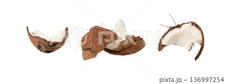 Coconut pieces, broken coco nut isolated, fresh tropical palm fruit slices, open cracked coconut 136997254