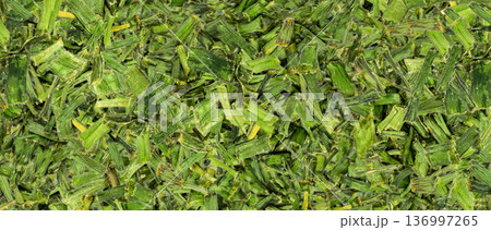 Dry chive pile pattern. Dried green onion flakes textured background 136997265