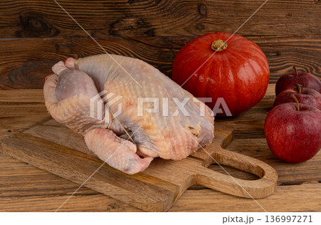 Helmeted guinea fowl raw meat 136997271