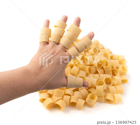 Raw Calamarata Big Pasta Isolated, Homemade Dry Macaroni, Italian Raw Round Noodle Raw Calamarata Big Pasta Isolated, Homemade Dry Macaroni, Italian Raw Round Noodle 136997425