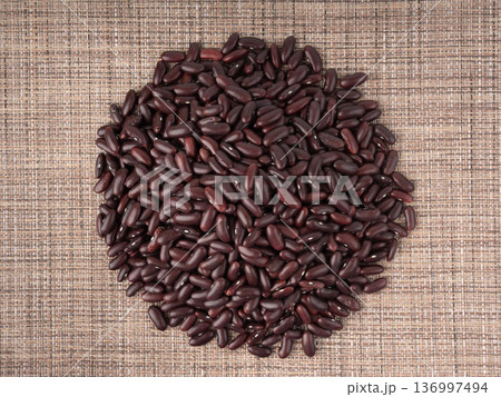 Red dry kidney beans. Uncooked bean pile, raw legume or red beans, rajma 136997494