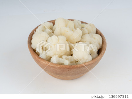 Steamed cauliflower pieces close up Steamed cauliflower pieces close up 136997511