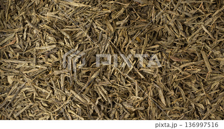 Green tea leaves macro textured background 136997516