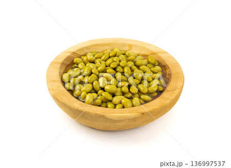 Edamame beans isolated. Green soy bean pile, cooked young soybean, boiled Japanese pea Edamame beans isolated. Green soy bean pile, cooked young soybean, boiled Japanese pea 136997537