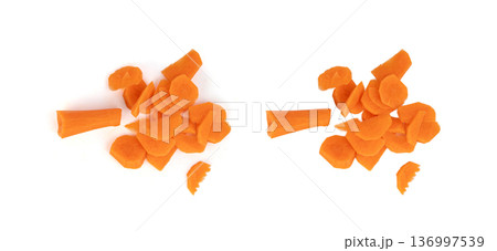 Finely chopped pieces of fresh carrots isolated 136997539