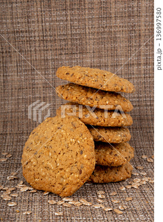 Whole and broken oatmeal cookies, cereal biscuits, fitness bakery 136997580