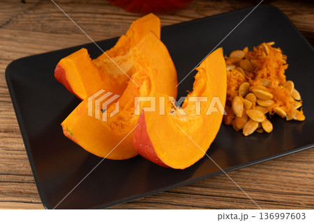 Red kuri squash or hokkaido pumpkin 136997603
