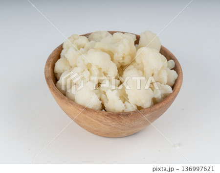 Steamed cauliflower pieces close up Steamed cauliflower pieces close up 136997621