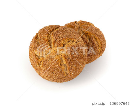 Brown rye bun isolated, round bread 136997645