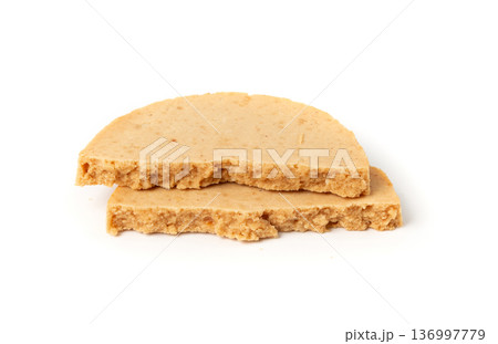 Protein cookie isolated, broken round energy snack with peanuts, chicory fibre Protein cookie isolated, broken round energy snack with peanuts, chicory fibre 136997779
