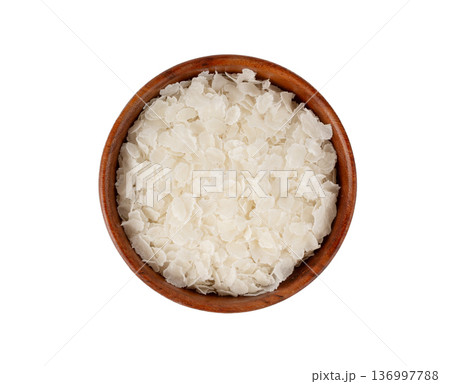 Raw flattened rice isolated. Dry rice flakes or poha, Indian breakfast food 136997788