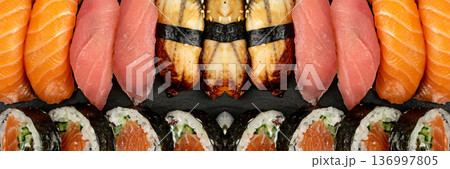 Set of Various Japanese Sushi Food on Dark Sate Plate Closeup. Nigiri and Nori Maki Sushi Rolls 136997805