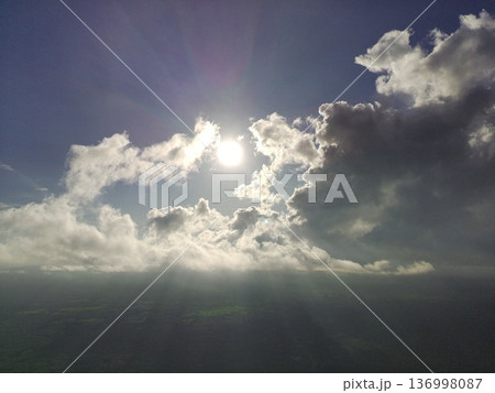 clouds and sun clouds and sun 136998087