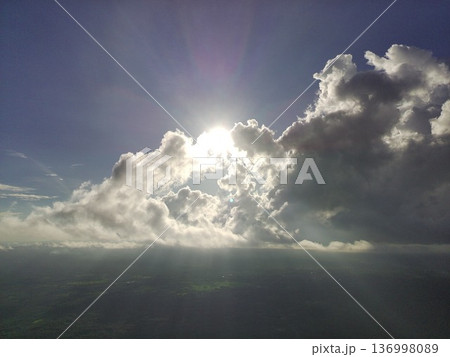 clouds and sun clouds and sun 136998089