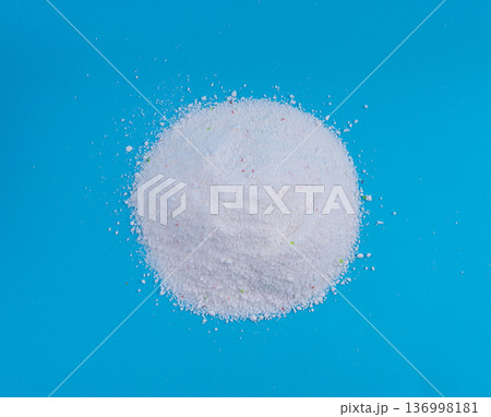 Detergent powder pile. Laundry washing soap granules, small white texture of oxygen bleach Detergent powder pile. Laundry washing soap granules, small white texture of oxygen bleach 136998181