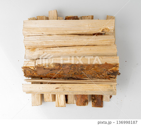 Firewood pile isolated, cut logs stack Firewood pile isolated, cut logs stack 136998187