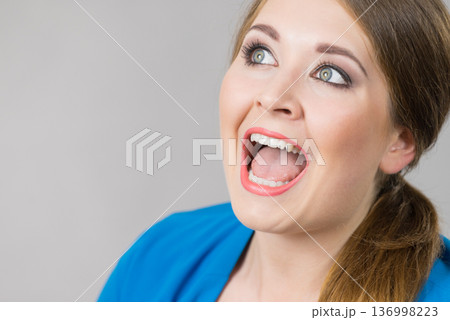 Shocked amazed woman portrait 136998223