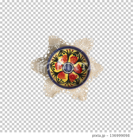 a small hand-painted bowl on a crocheted doily a small hand-painted bowl on a crocheted doily 136999098
