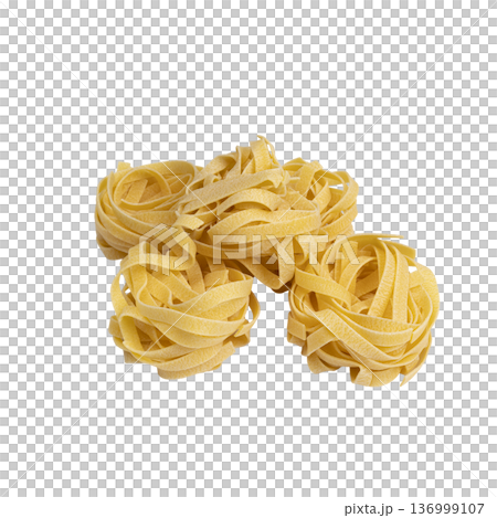 uncooked tagliatelle pasta uncooked tagliatelle pasta 136999107