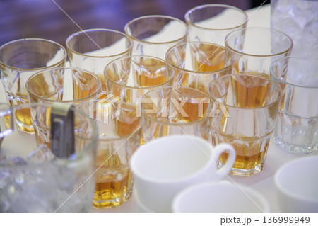 Glasses with drinks at corporate event 136999949