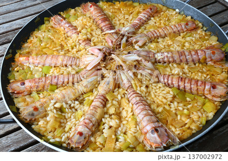 Mediterranean Rice with Prawns or Langoustines 137002972