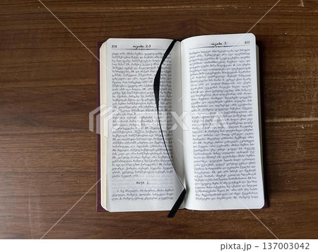 new testament on the wooden background. thing from chirch 137003042
