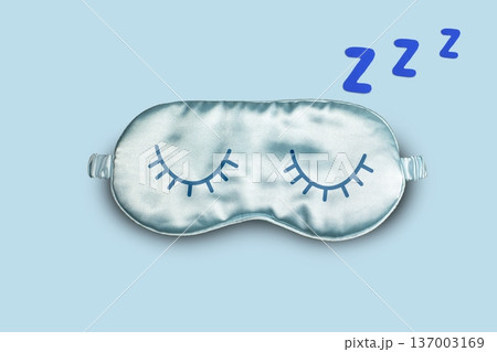 World Sleep day, Sleeping mask on light blue background and letters Z symbolizing deep sleep and dreaming with copy space World Sleep day, Sleeping mask on light blue background and letters Z symbolizing deep sleep and dreaming with copy space 137003169