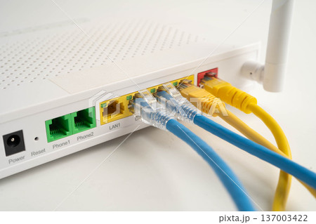 Ethernet cable with wireless router connect to internet service provider network. Ethernet cable with wireless router connect to internet service provider network. 137003422