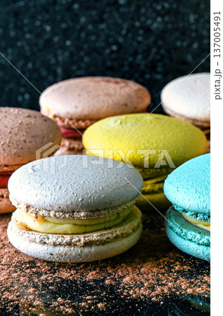 Macaron cakes. Macarons showcases their delicate s and creamy filling. 137005491