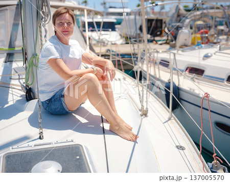 Adult Woman Enjoying Sunny Day On Yacht Finike Marina Turkey Adult Woman Enjoying Sunny Day On Yacht Finike Marina Turkey 137005570