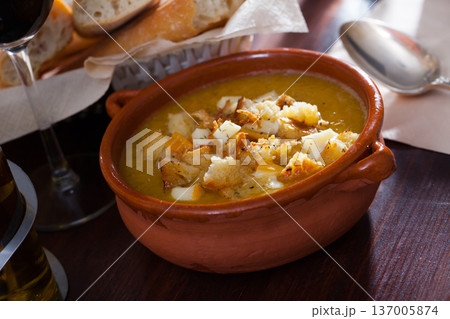 Vegetable cream soup with croutons and cheese Vegetable cream soup with croutons and cheese 137005874