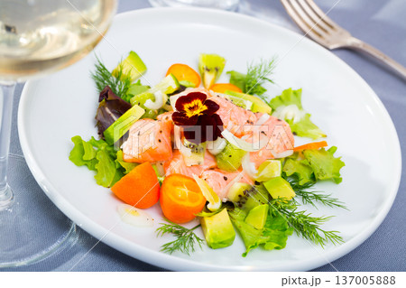 Tasty seafood ceviche from salmon with avocado, green dill and cumquat Tasty seafood ceviche from salmon with avocado, green dill and cumquat 137005888