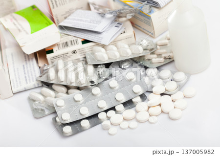 Many different pills and medical capsules close up 137005982