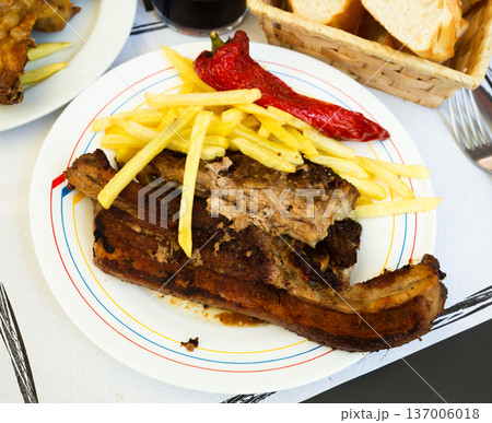 Grilled veal meat with potatoes. Churrasco de ternera. Spanish cuisine Grilled veal meat with potatoes. Churrasco de ternera. Spanish cuisine 137006018