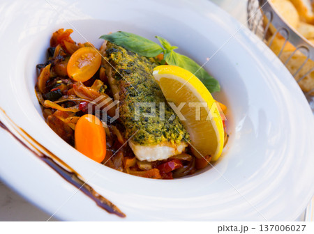 White fish baked with vegetables 137006027