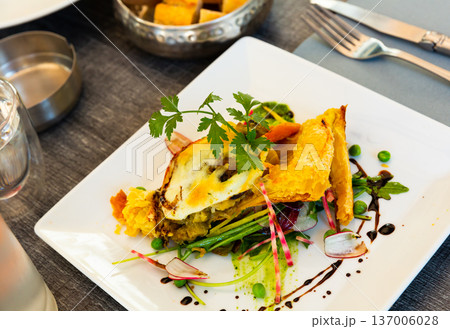 Tarte with vegetables and buffalo mozzarella Tarte with vegetables and buffalo mozzarella 137006028