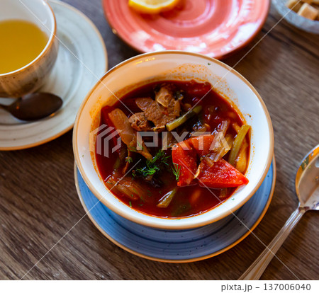 Portion of lagman, Central Asian dish of pulled noodles, meat Portion of lagman, Central Asian dish of pulled noodles, meat 137006040