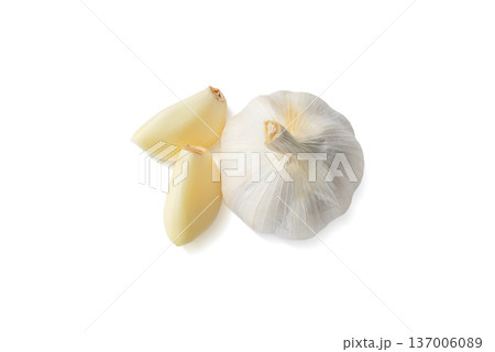 Fresh Garlic Bulb and Peeled Cloves - Top View Isolated on White 137006089
